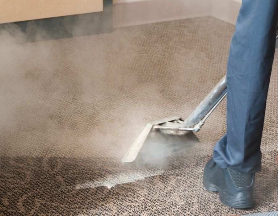 Professional steam cleaning service by Carolina Carpet Cleaning in the Lowcountry, using hot water extraction to deep clean patterned carpet and remove embedded dirt and allergens for a refreshed, spotless finish
